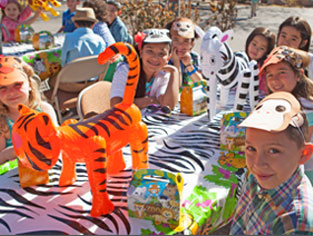 Kids having birthday party at zoo