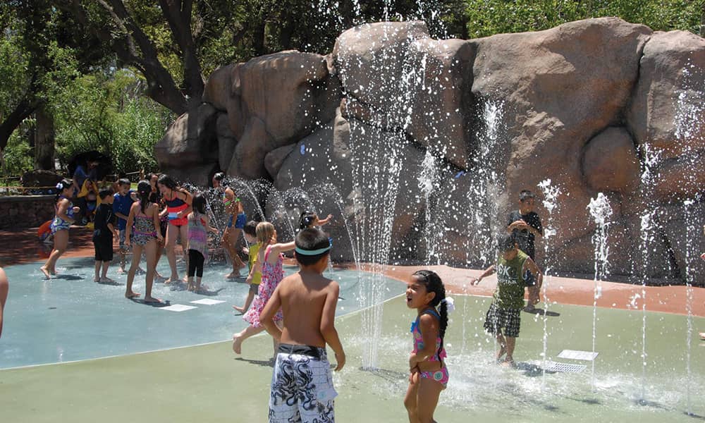 Kids playing in the spash pads.
